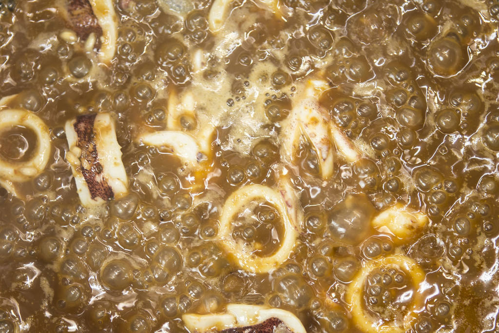 Arroz caldoso de calamar de potera, cigalas y mejillones
