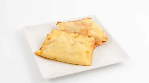 Fusión de huevos estrellados con virutas de jamón ibérico Fusión de huevos estrellados con virutas de jamón ibérico