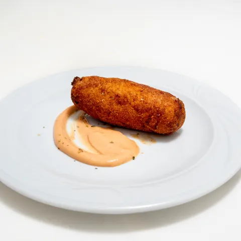 Croqueta pulpo y gamba en salsa kimchi