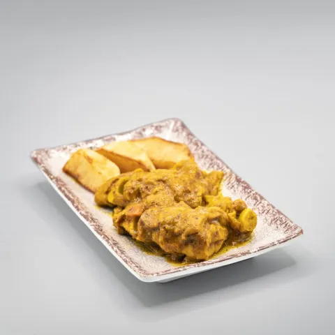 Manitas de cerdo, vino y verduras componen parte de esta tapa que es un secreto familiar bien guardado